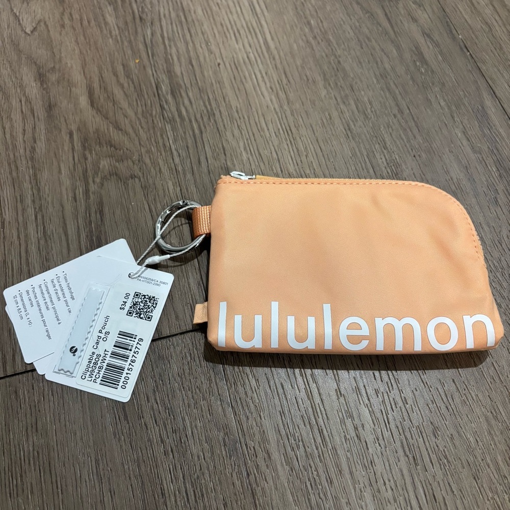NWT lululemon peach water-resistant Zip Clippable Keychain Card & Coin pouch